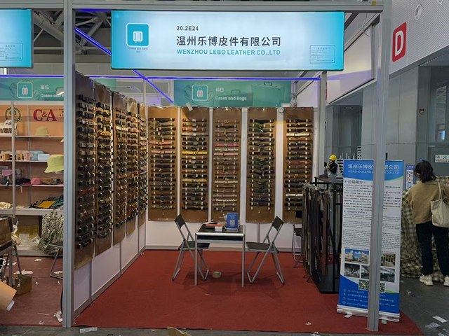 Real belt sample booth with display boards for logo, hardware, and presentation review